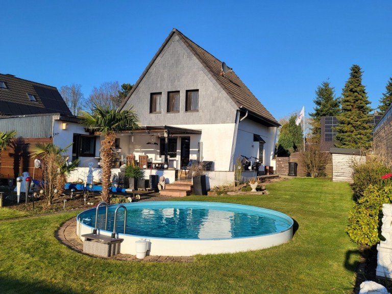 R�ckansicht Meerbusch/Osterath Einfamilienhaus FREISTEHENDES HAUS MIT EINLIEGERBEREICH UND SCH�NEM GARTEN IN MEERBUSCH-OSTERATH ZU VERKAUFEN...