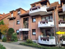Hausansicht 1 VERMIETETE ERDGESCHOSS-WOHNUNG MIT TERRASSE UND TG-PLATZ IN GREVENBROICH-CITY ZU VERKAUFEN...