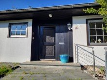 Hauseingang FREISTEHENDER BUNGALOW MIT KELLER UND GROSSER GARAGE IN FELDRANDLAGE VON TITZ-AMELN ZU VERKAUFEN...