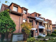 Hausansicht 2 VERMIETETE ERDGESCHOSS-WOHNUNG MIT TERRASSE UND TG-PLATZ IN GREVENBROICH-CITY ZU VERKAUFEN...