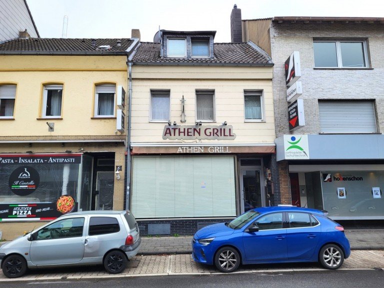 Hausansicht Bedburg Haus VERMIETETES HAUS MIT IMBISS UND WOHNUNG IN ZENTRALER LAGE VON BEDBURG ZU VERKAUFEN...