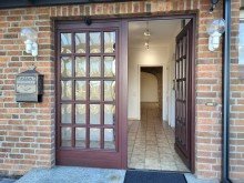 Hauseingang FREISTEHENDES EINFAMILIENHAUS MIT GARAGE UND KELLER IN MEERBUSCH-OSTERATH ZU VERKAUFEN...